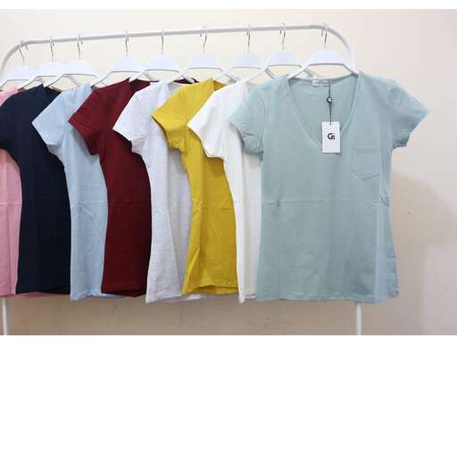 a row of shirts on a hanger