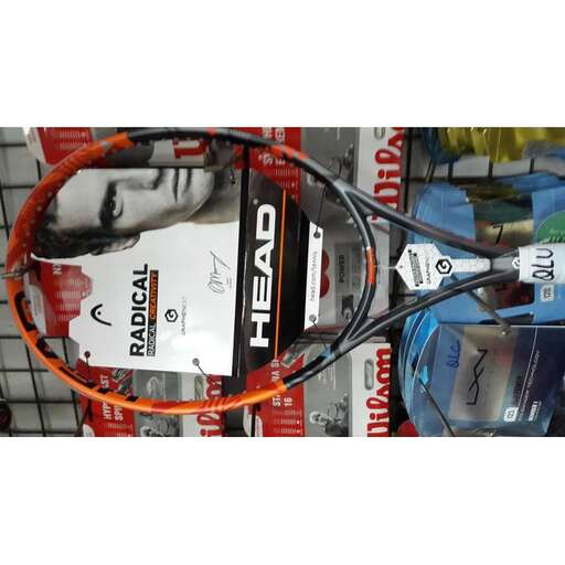 a tennis racket with a picture of a man's face on it.