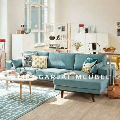 a living room with a couch and a table.