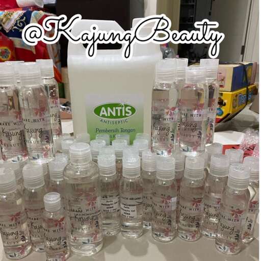 a bunch of bottles of water on a table.