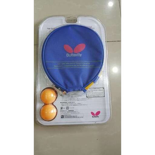 two eggs are sitting on a plastic bag.