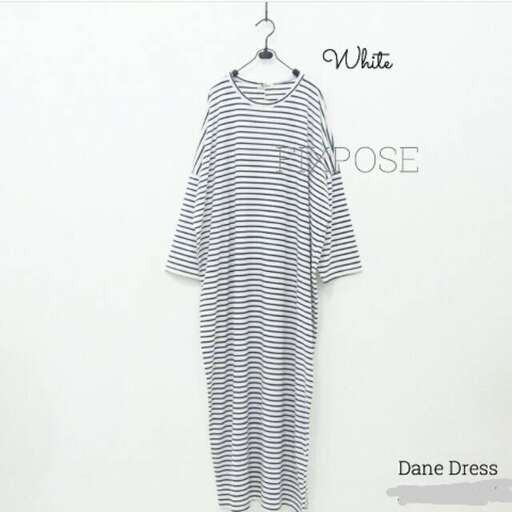 a dress made of a striped fabric.