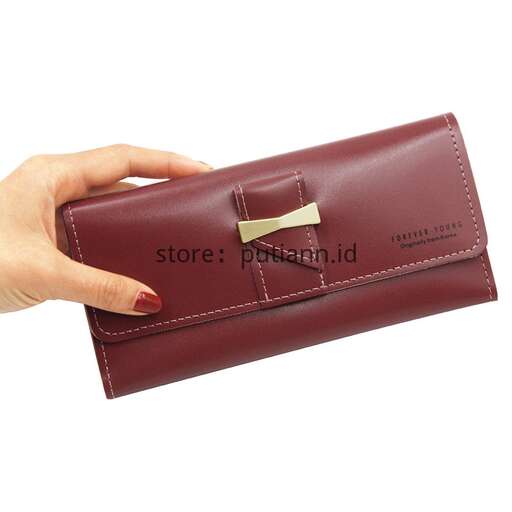 wallet in a female hand