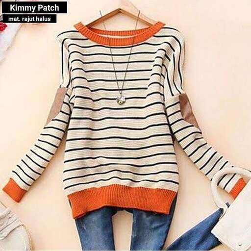 striped long sleeve top with orange stripe and orange trim.