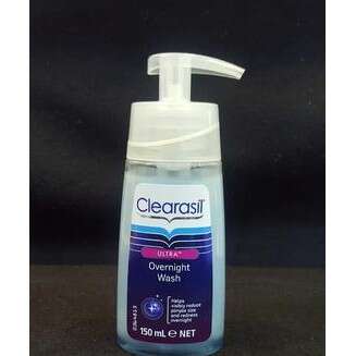 a bottle of soap with a white top.