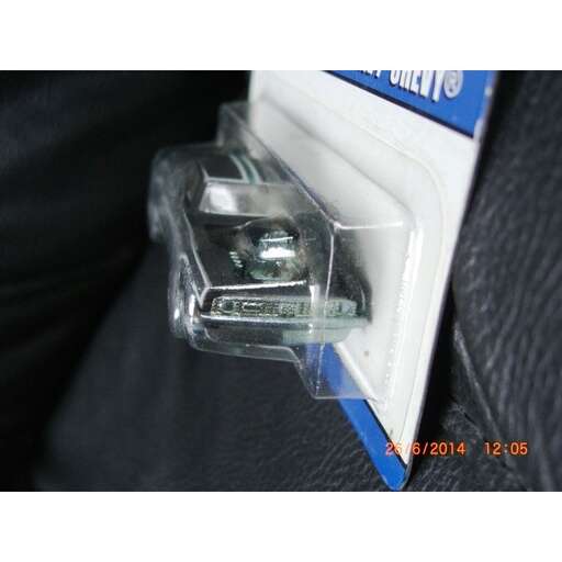 a small silver object in a blue and white package.