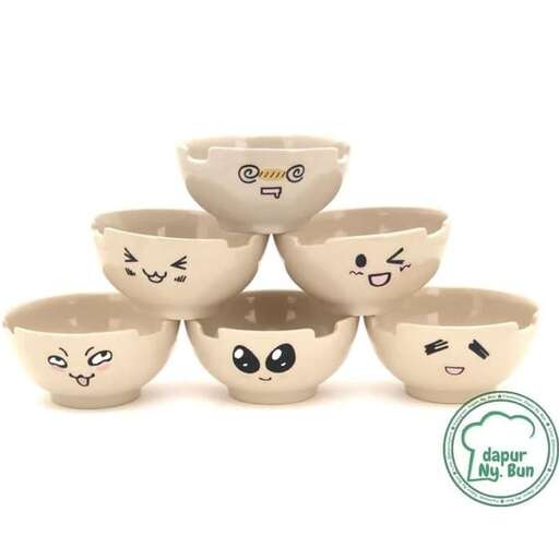 a set of bowls with faces.