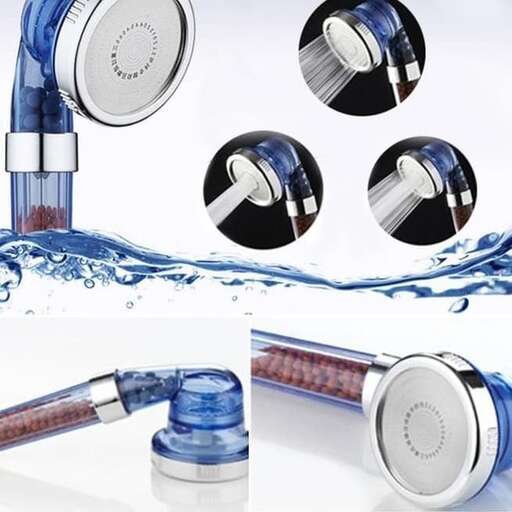 a set of faucets and a glass of water.