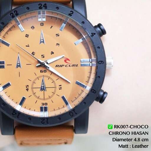 a watch with a black face and a brown leather strap.