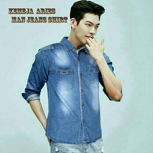 actor in a denim shirt