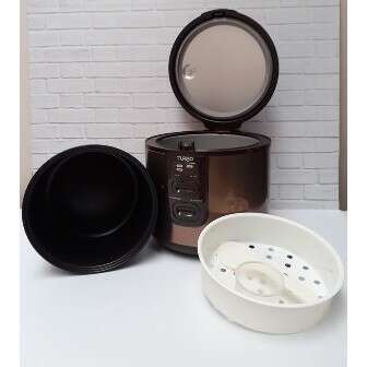 a bowl and a bowl are sitting on a table.