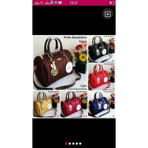 a variety of bags are displayed on a table.