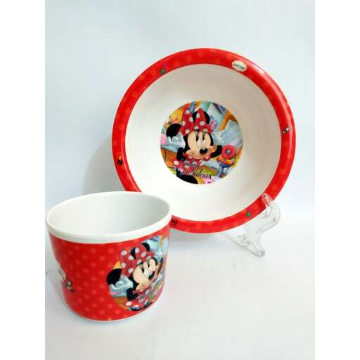 a red and white plate with a picture of film character on it.