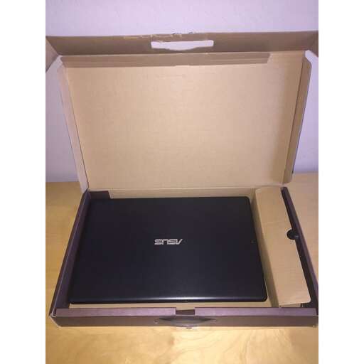 a box with a lid open and a keyboard inside