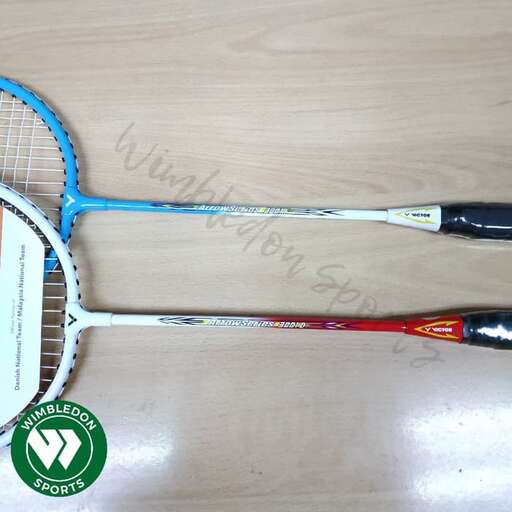two tennis rackets with a logo on them.