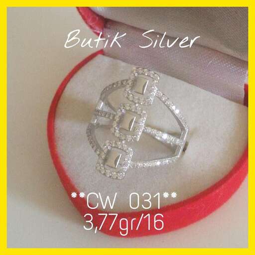 silver medal with a cross