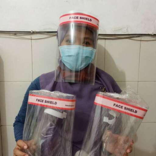 a person wearing a mask and wearing a mask.