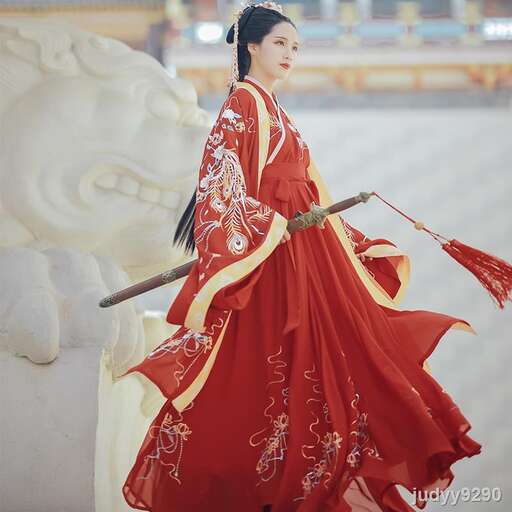 a woman in a red kimono