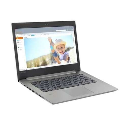 a laptop computer with a picture of a boy on the screen.