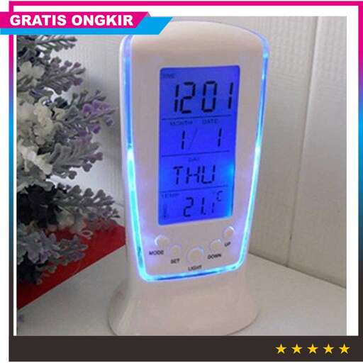 a clock with a blue light on it is shown.