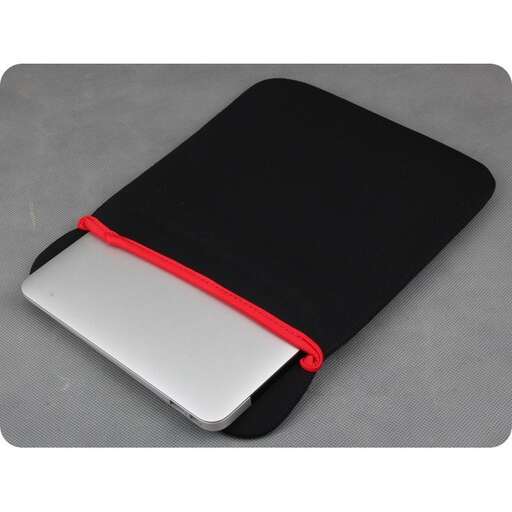 the red band is wrapped around the edge of the notebook.