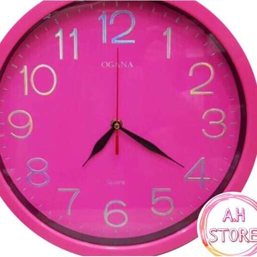 pink clock with a pink background