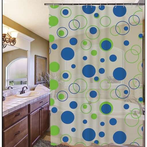 a large green and blue shower curtain with circles on the wall.