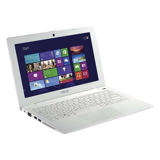 a white laptop computer with a black cord.